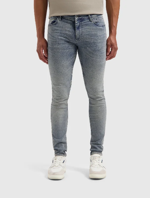 Men's Jeans with RipsThe Jone Skinny Fit Jeans | Denim Mid Blue